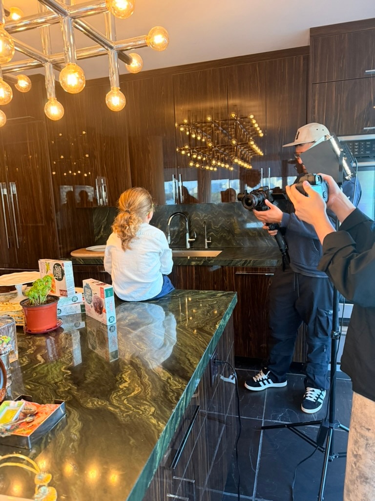 An editorial kitchen shoot with a brand product in frame, brand storytelling at work.